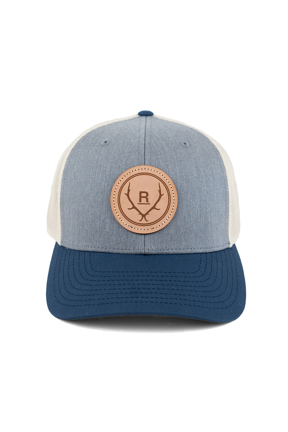 REVOLVR simplify trucker cap in grey, birch and navy with leather logo patch on front and adjustable snapback front view