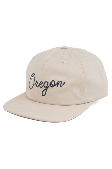 REVOLVR signature embroidered Oregon cap in birch with leather strap on back profile view