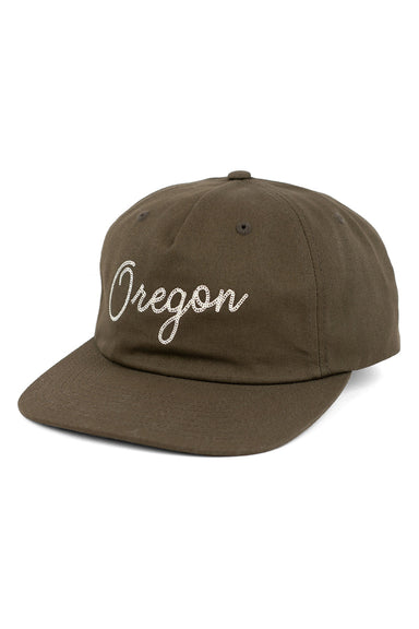 REVOLVR signature embroidered Oregon cap with leather strap on back profile view