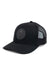 REVOLVR simplify trucker cap in black with leather logo patch on front and adjustable snapback profile view