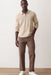 Marine Layer 5 Pocket Flex Terry Cords in Taupe — Lifestyle view