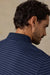 Faherty Movement Pique Polo in Twilight Stream Stripe — Quarter view