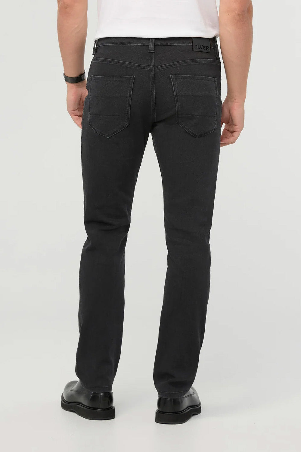 duer-performance-denim-slim-straight-worn-black-back