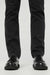 duer-performance-denim-slim-straight-worn-black-hem