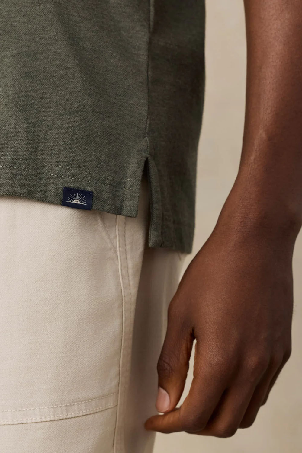 faherty-movement-pique-polo-tropics-olive-melange-hem
