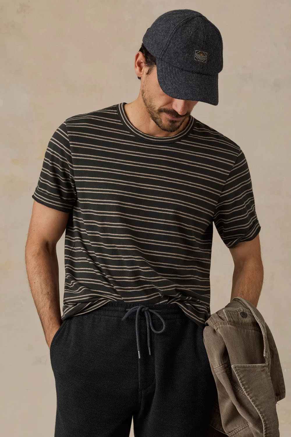 Faherty - Sunwashed Tee - Black Sand Stripe - Model Front