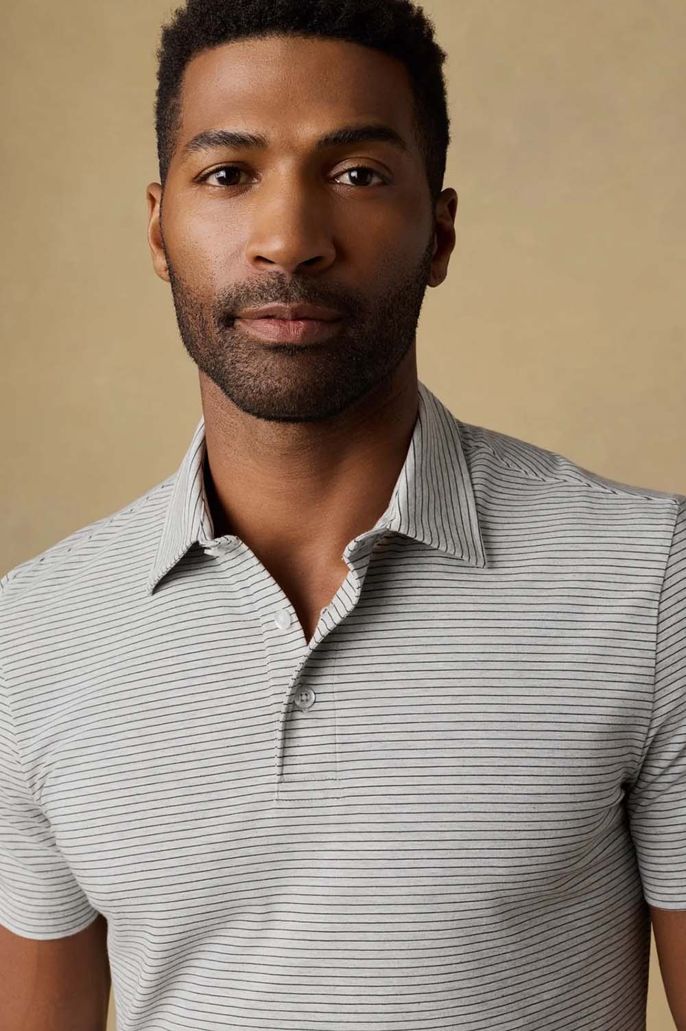 faherty ss movement polo dark cloud stripe detail