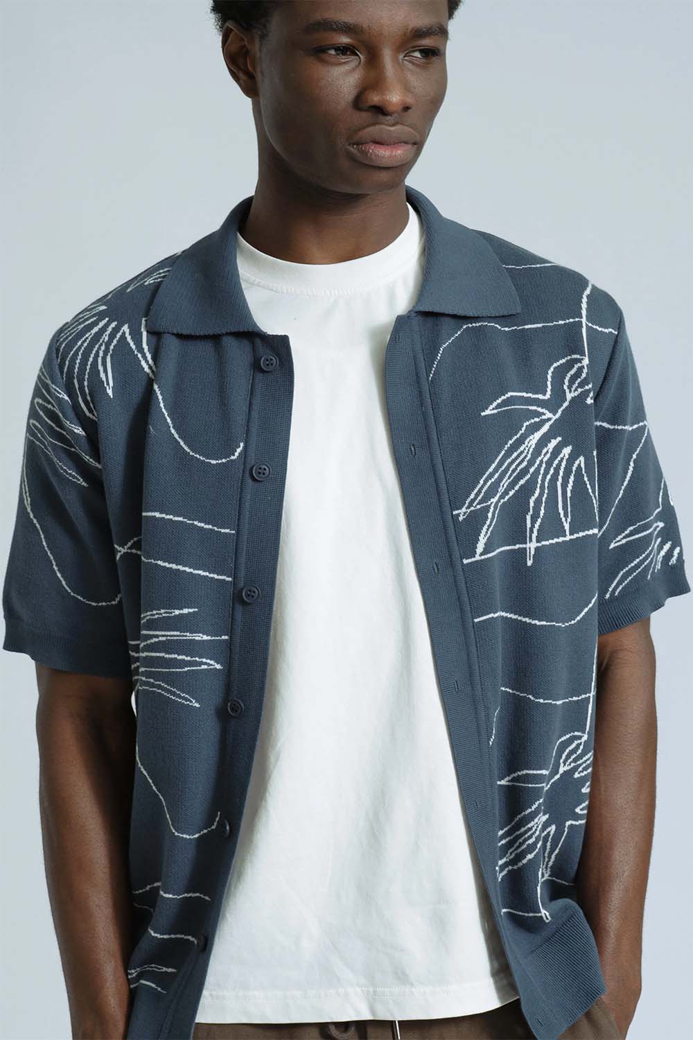far afield zigger knitted shirt blue palms  front