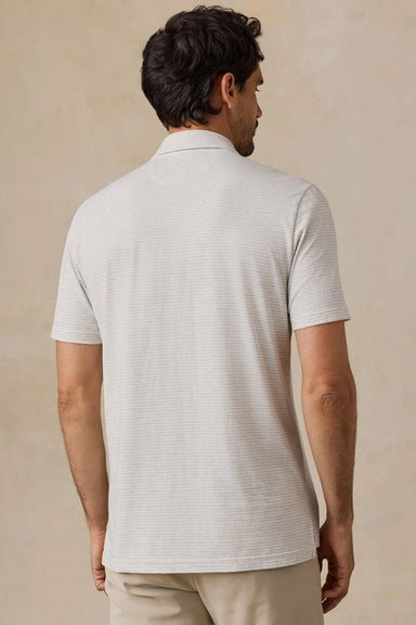 Faherty Movement Polo in Quarry White Stripe — Back view