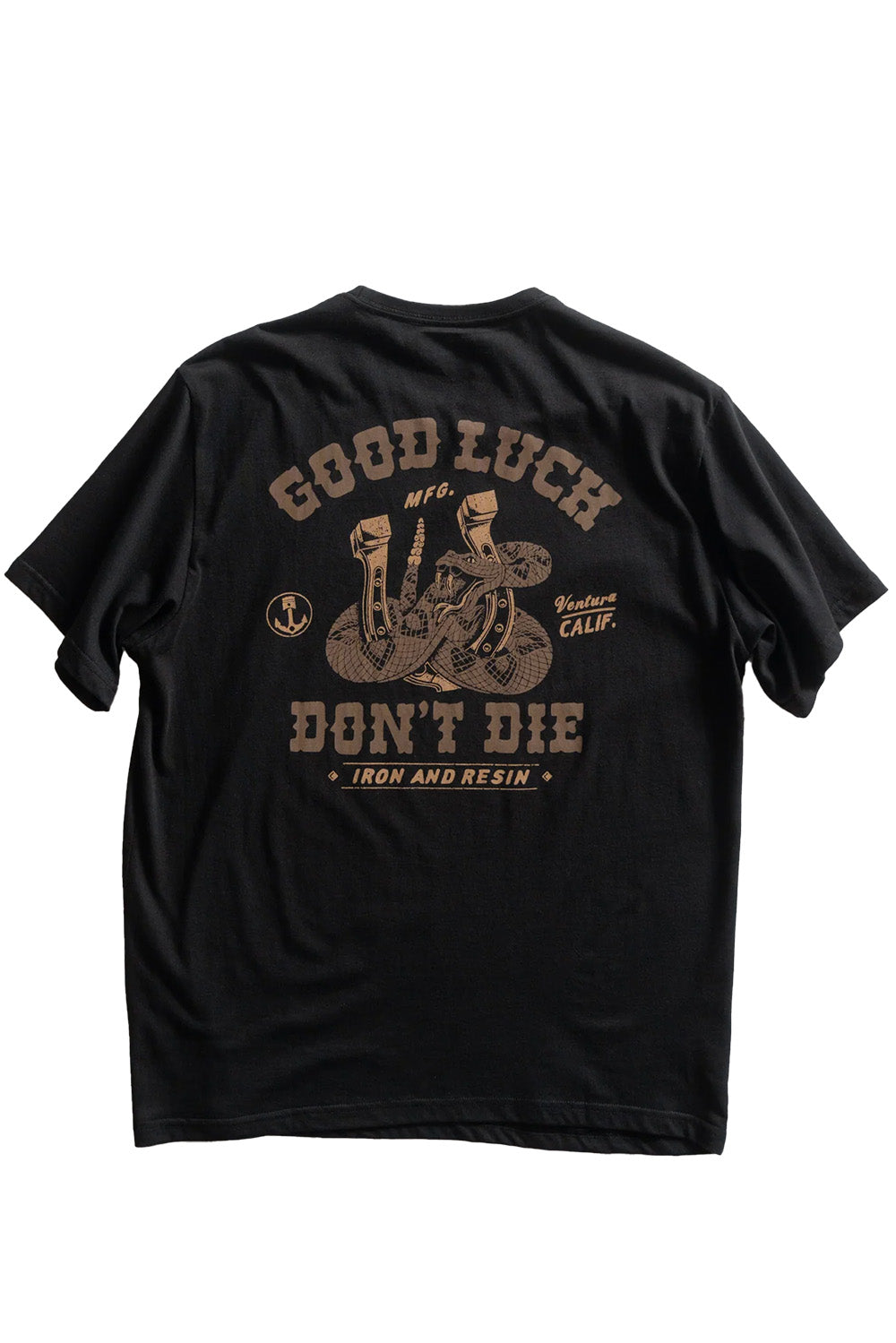 iron and resin lucky horseshoe tee black flatlay