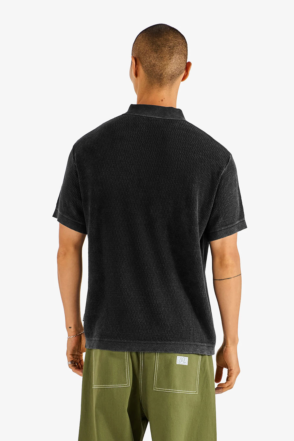 malbon brickwork polo in black back view
