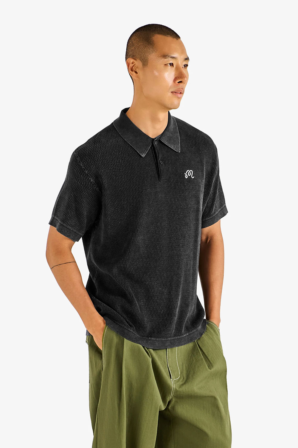 malbon brickwork polo in black front view