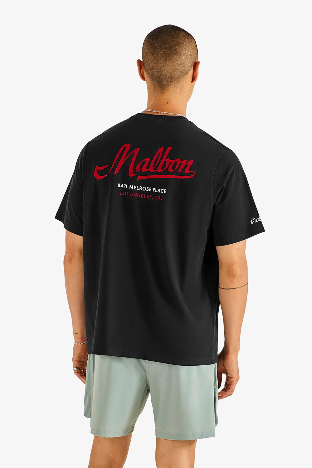 malbon division short in lily pad back view