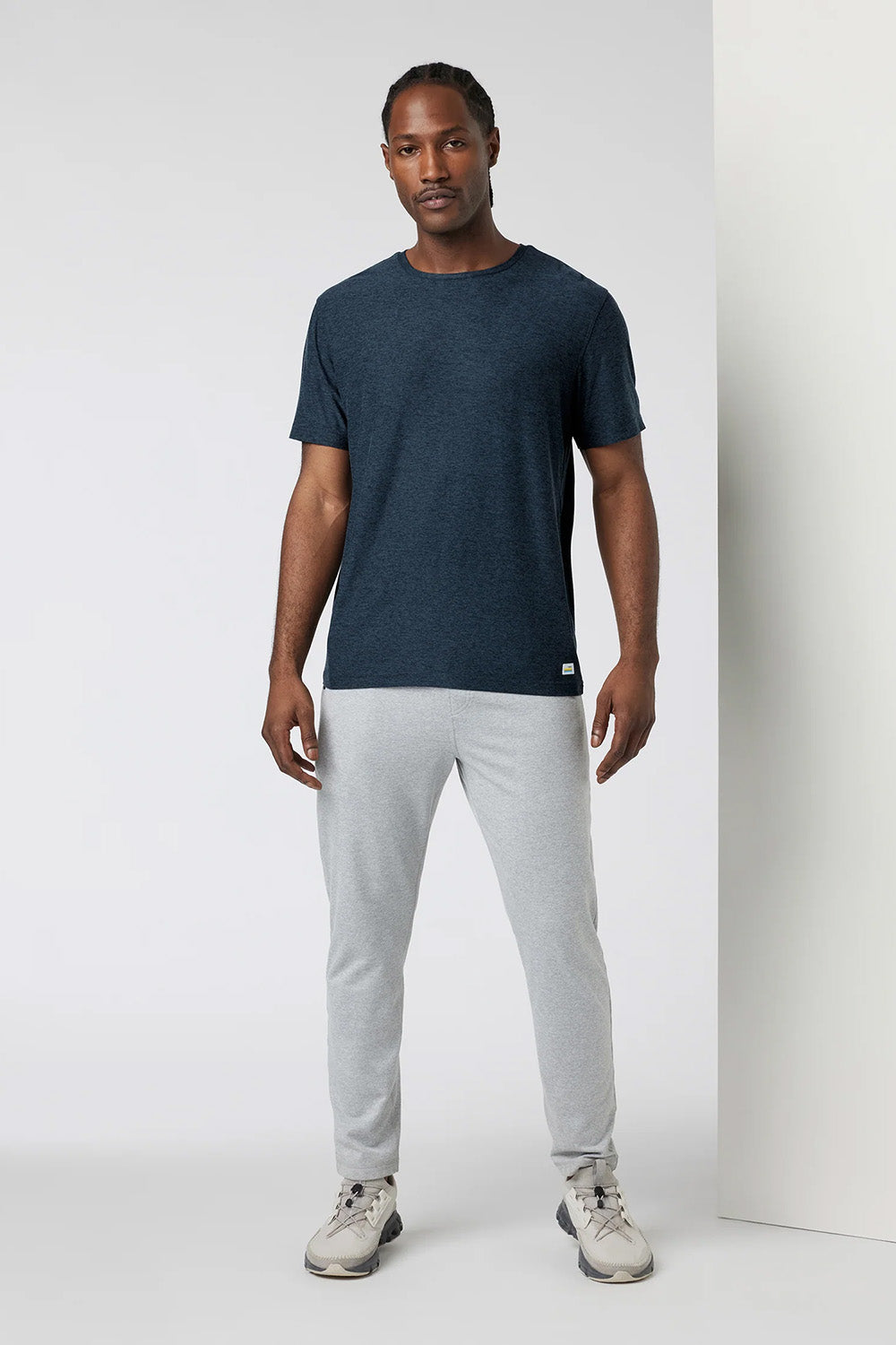 Vuori - Strato Tech Tee - Navy Heather - Model Front