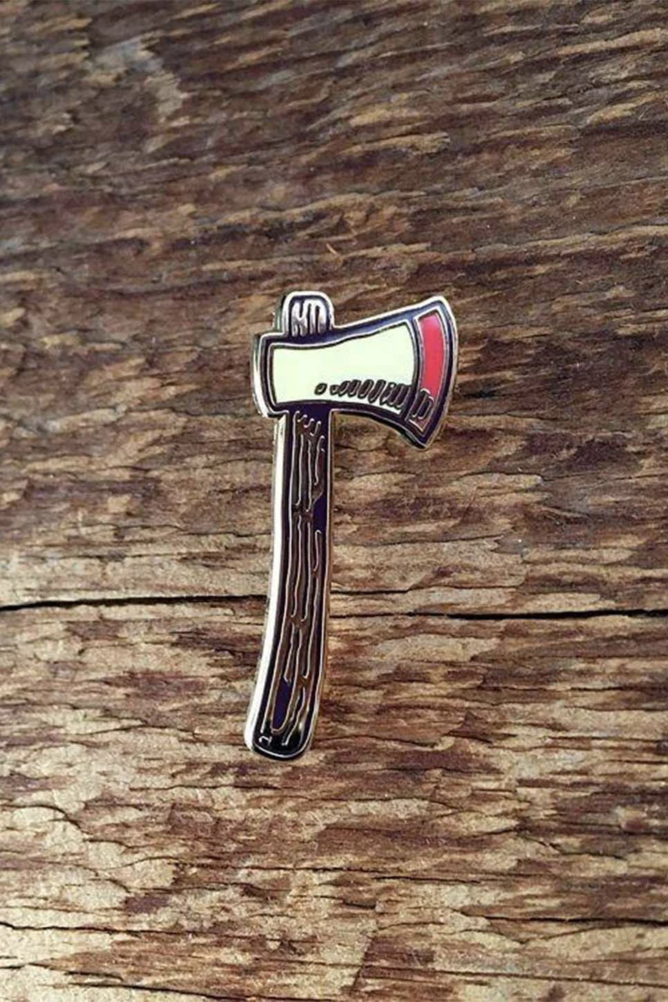 noteworthy-paper-and-press-axe-pin-front