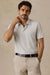Faherty Movement Polo in Quarry White Stripe — Front view