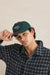 rhythm script trucker cap green model