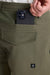 Roark Revival Layover Pro Traveler Pant in Military — Pocket detail view