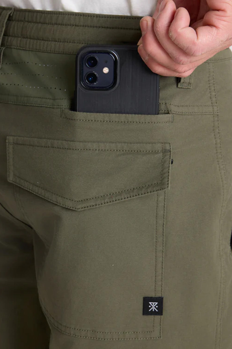 Roark Revival Layover Pro Traveler Pant in Military — Pocket detail view