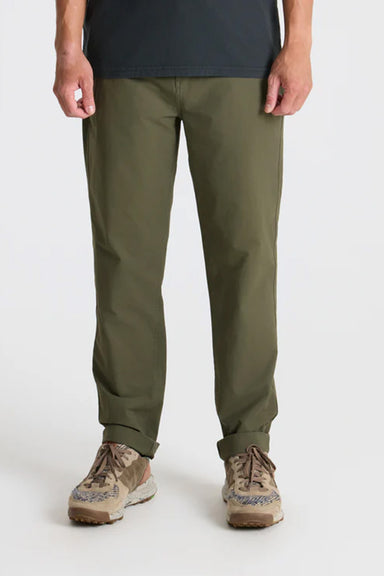 Roark Revival Layover Pro Traveler Pant in Military — Front view, on model