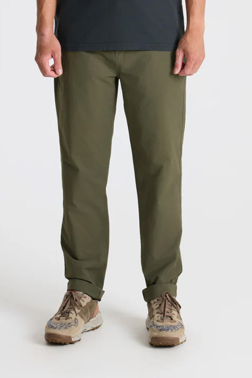 Roark Revival Layover Pro Traveler Pant in Military — Front view, on model