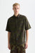 scotch and soda printed ripstop shirt painterly animal olive night front