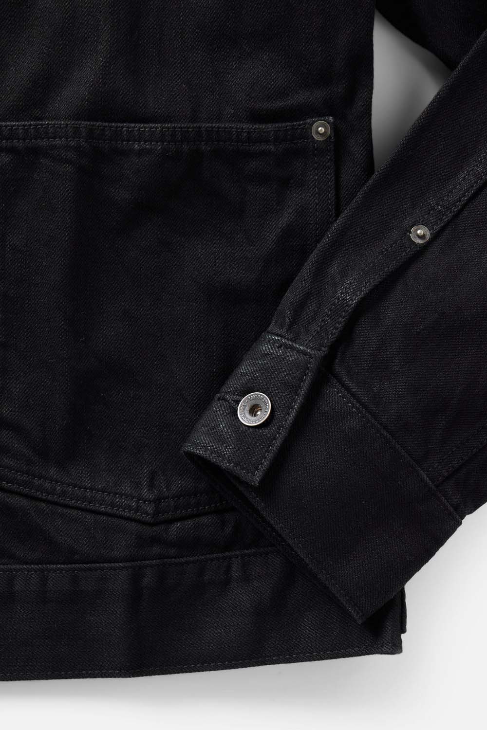 Taylor Stitch Ryder Jacket in Rinsed Black Organic Selvedge — Cuff detail view