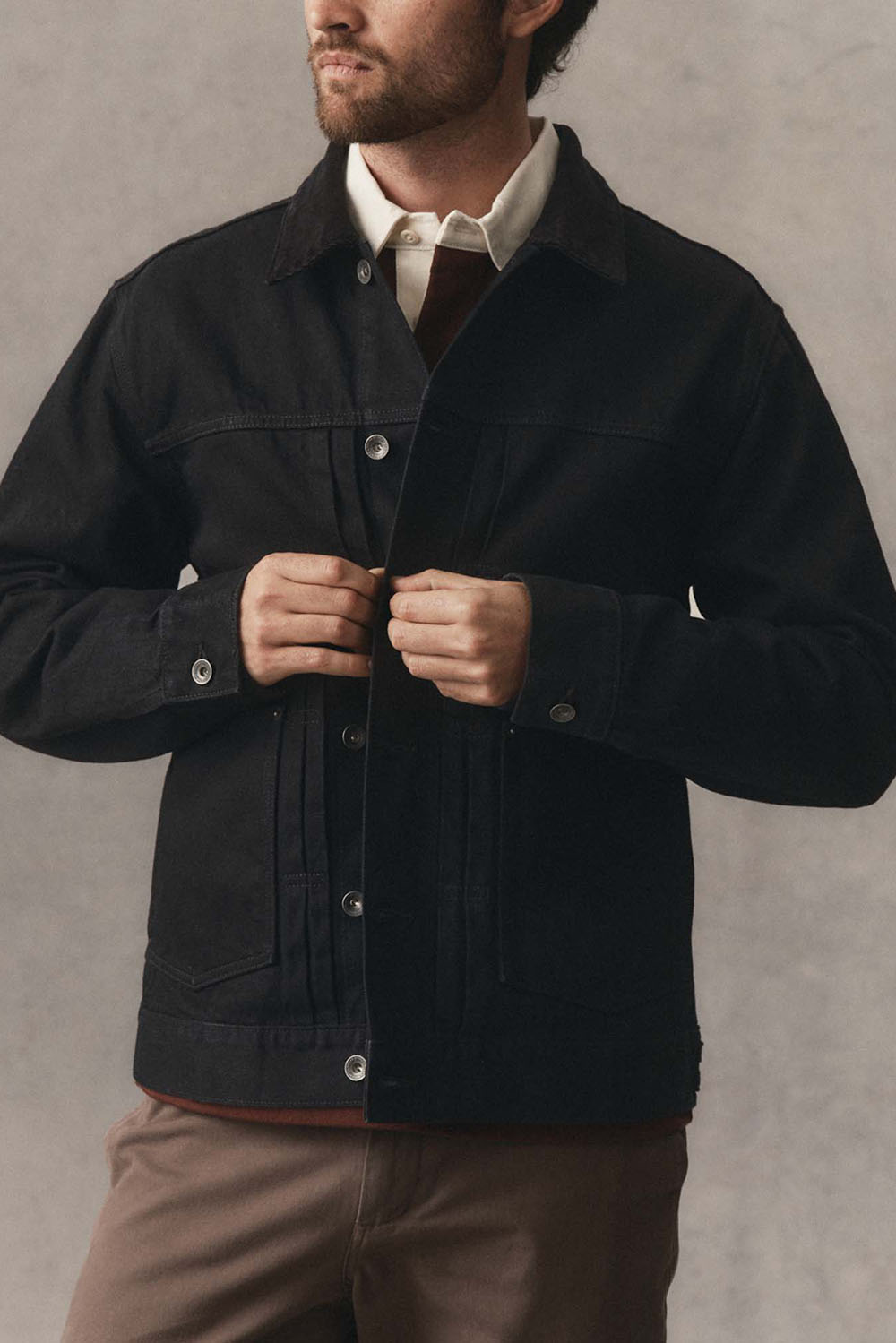 Taylor Stitch Ryder Jacket in Rinsed Black Organic Selvedge — Front view, on model