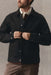 Taylor Stitch Ryder Jacket in Rinsed Black Organic Selvedge — Front view, on model