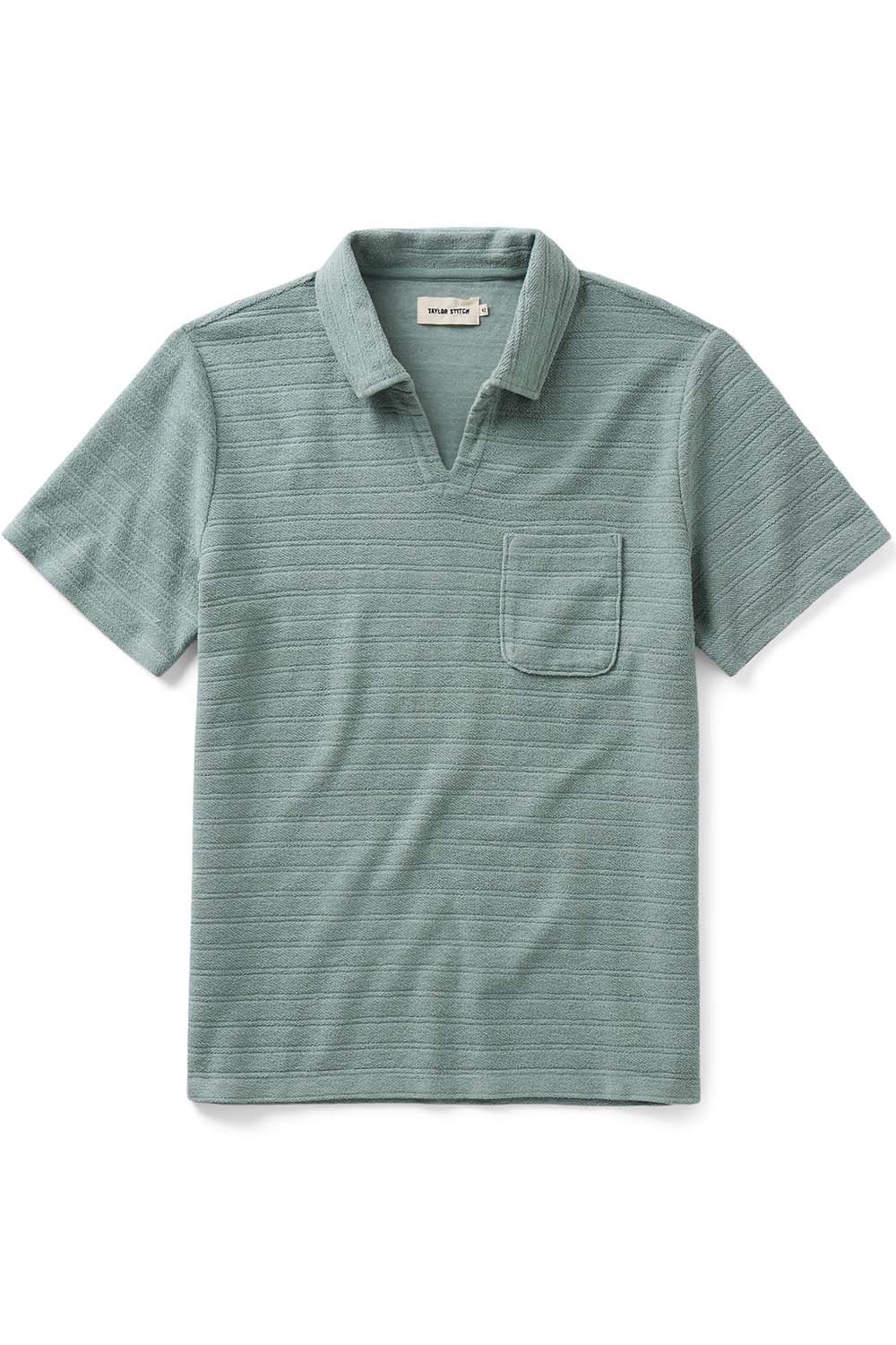 taylor stitch the meridian polo in faded pine flatlay