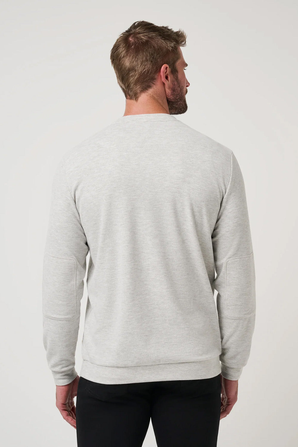 Travis Mathew Cloud Sweater in Heather Grey — Back view