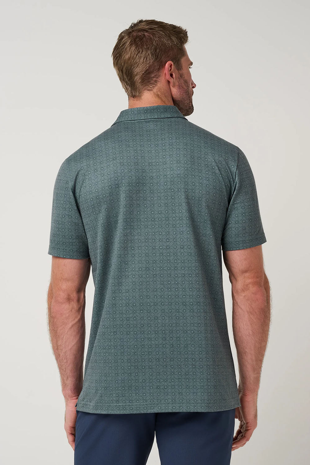 travis-mathew-featherweight-trophy-ready-balsam-green-back