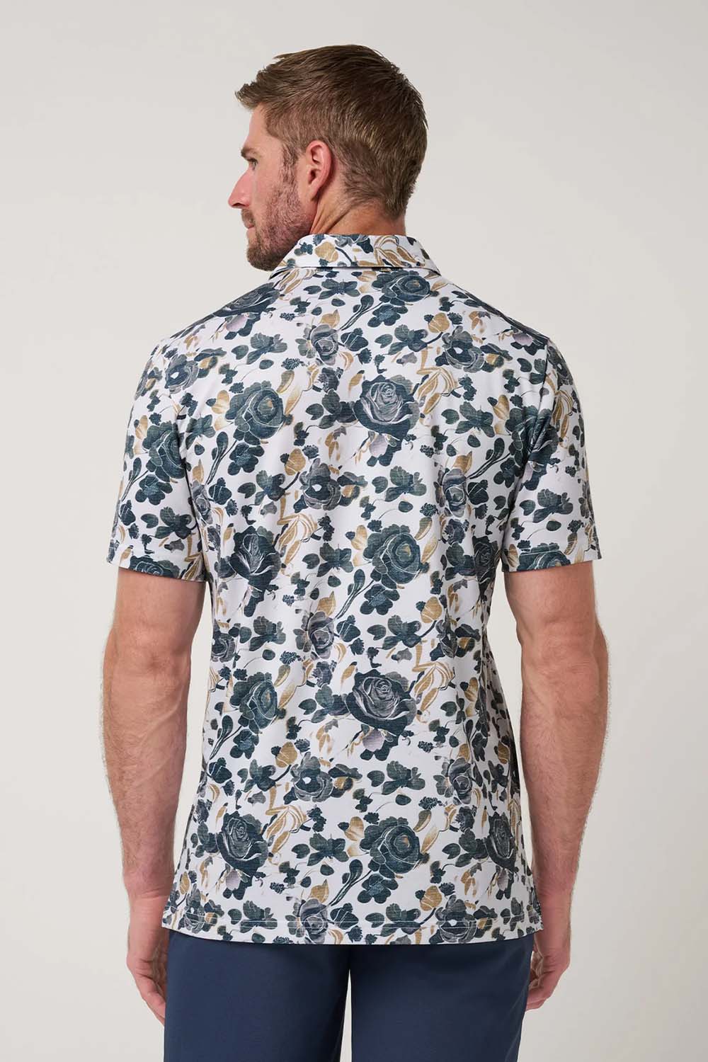 travis-mathew-featherweight-villa-polo-white-back