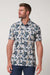 travis-mathew-featherweight-villa-polo-white-front