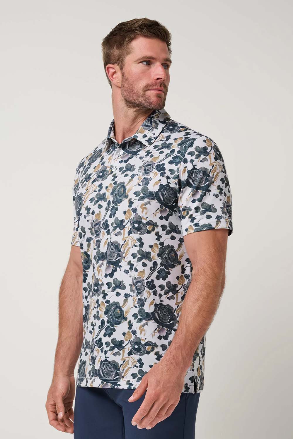 travis-mathew-featherweight-villa-polo-white-side