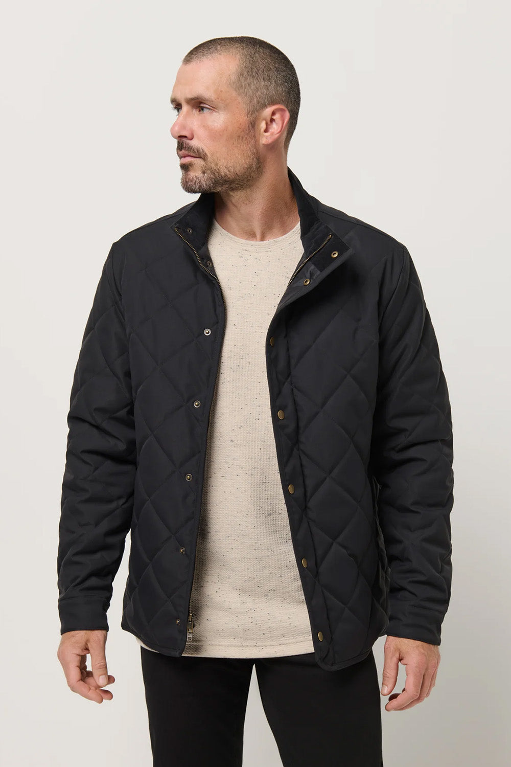 Travis Mathew Highlander Jacket in Black — Quarter view
