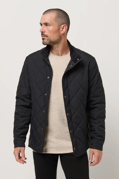 Travis Mathew Highlander Jacket in Black — Quarter view