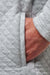 Travis Mathew Transatlantic Quarter Zip in Heather Lt Grey — Detail hand pocket view