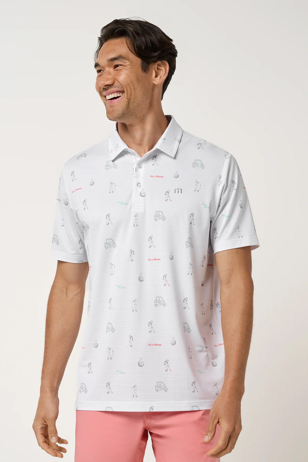 travis mathew on a mission polo in white front view