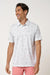 travis mathew on a mission polo in white front view