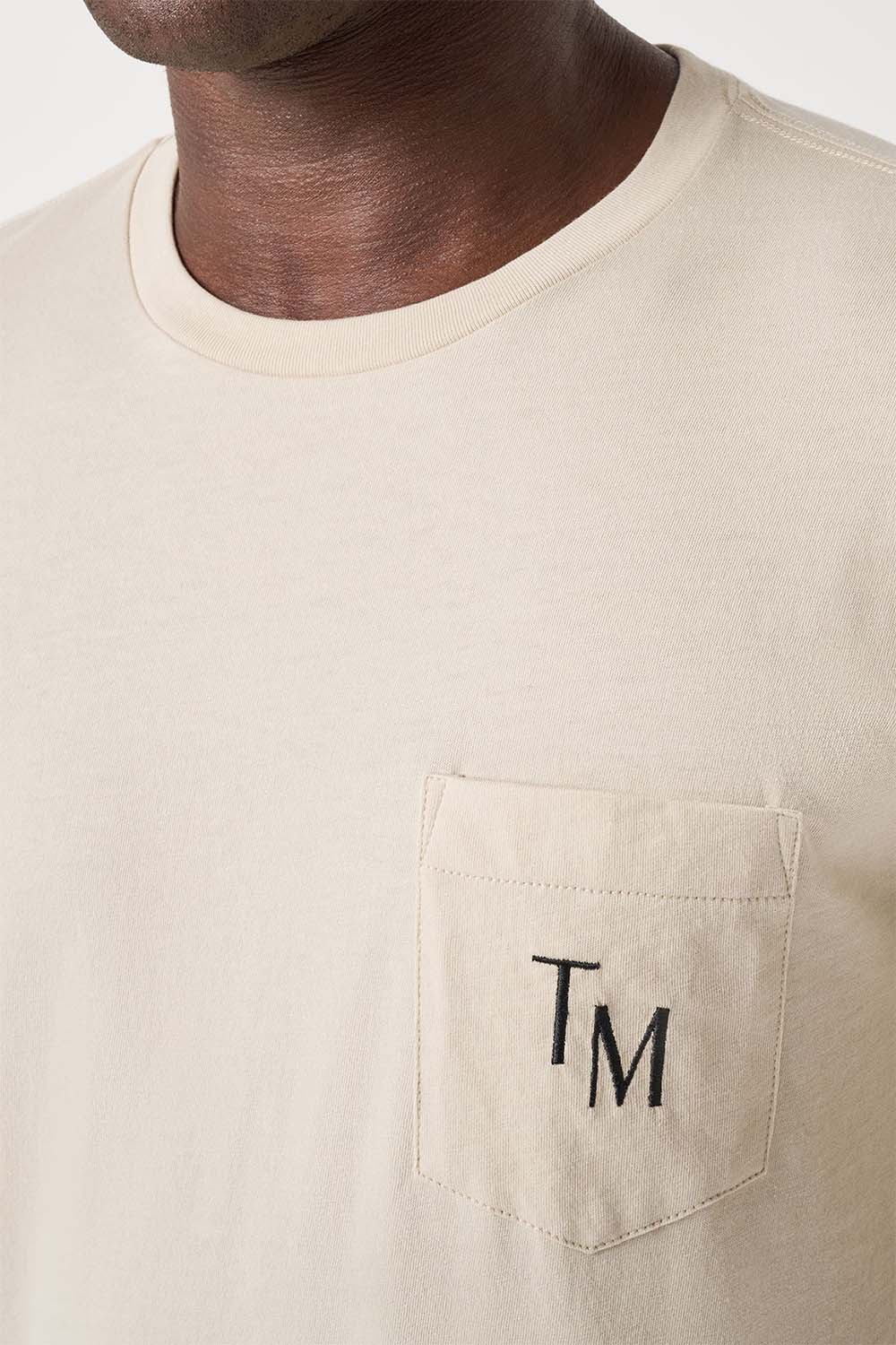 travis mathew ab energy tee italian sand detail