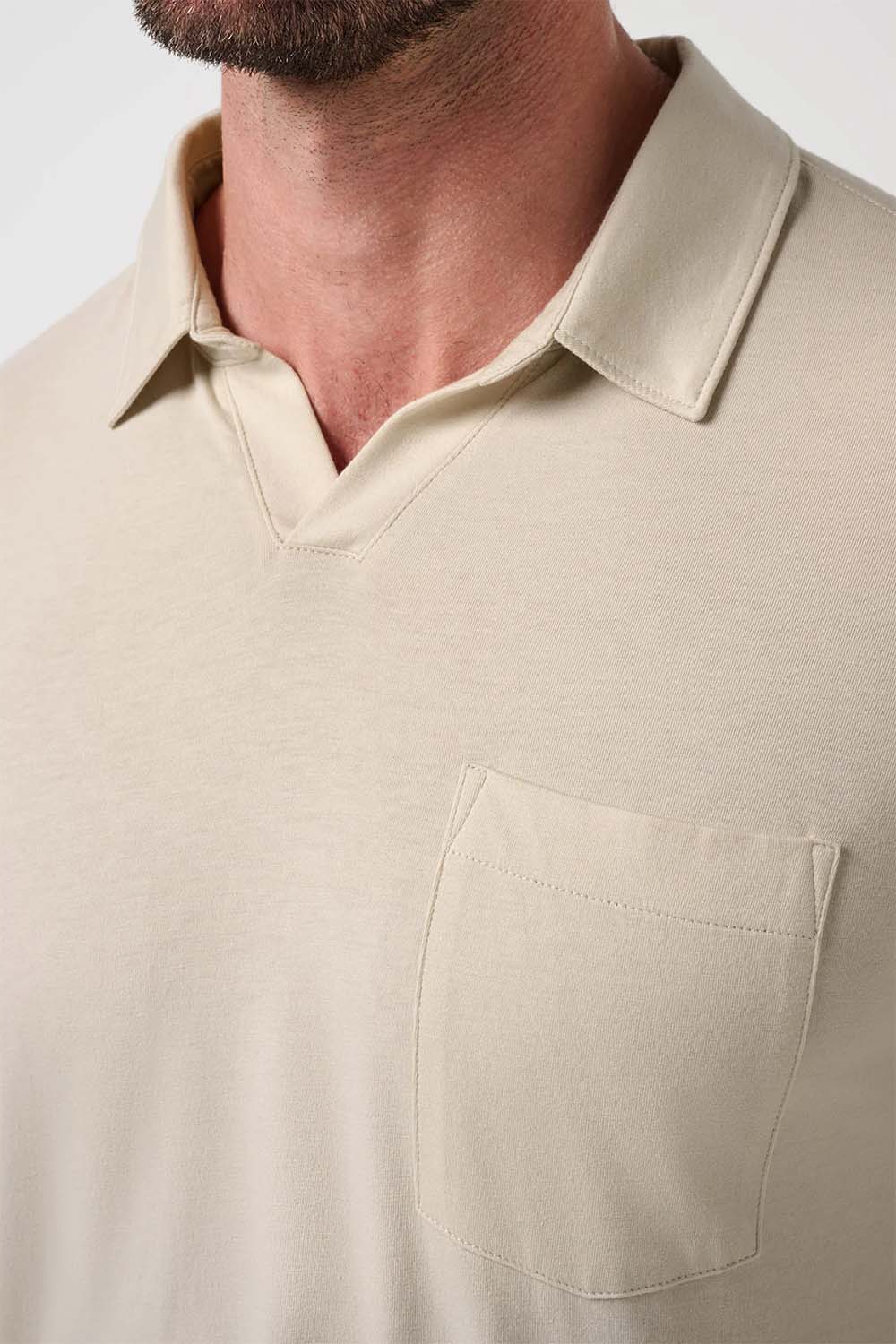 travis mathew cloud popover polo italian sand detail