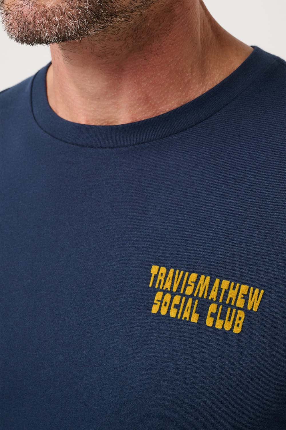 travis mathew club dues tee total eclipse detail