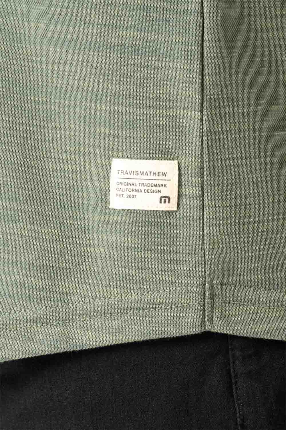travis mathew clubhouse classic polo sea spray hem