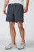 Vuori Kore Short Lined 7" in Charcoal — Front view, on model