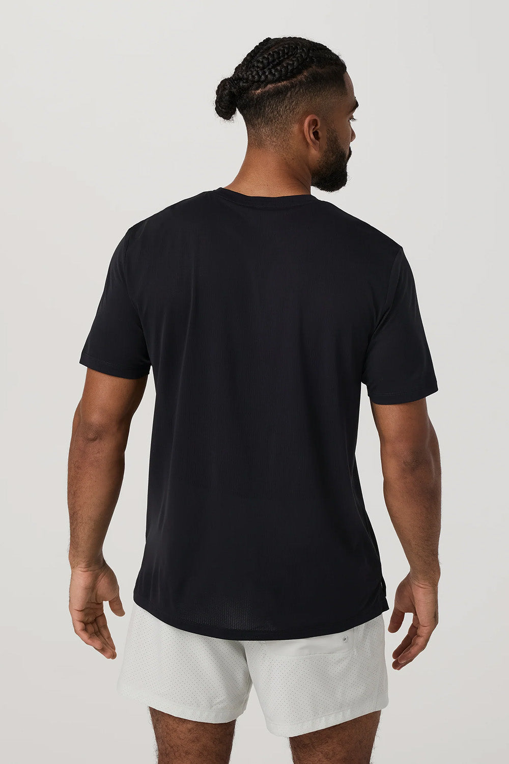 Vuori Strato Breathe Tee in Black — Back view