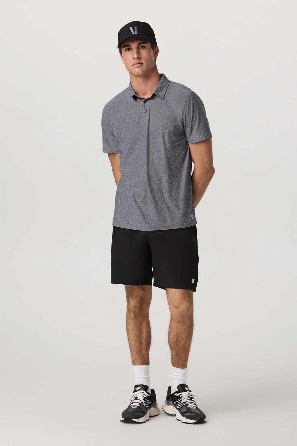 Vuori Strato Tech Polo in Heather Grey — Full-body view