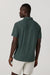 Vuori Strato Tech Polo in Hemlock Heather — Back view
