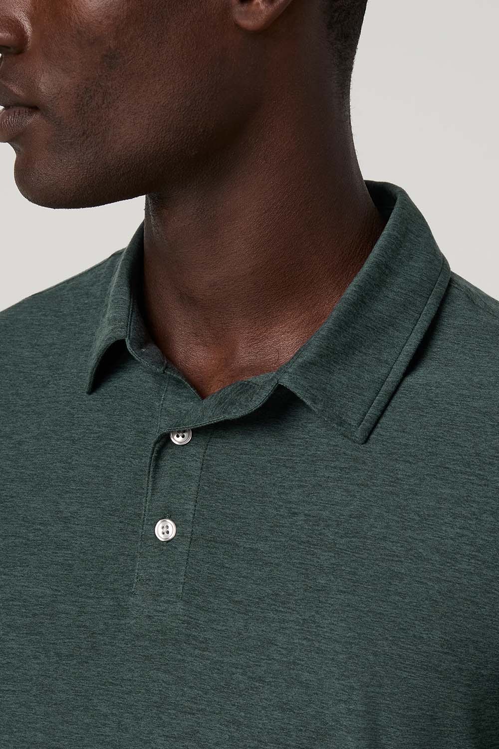 Vuori Strato Tech Polo in Hemlock Heather — Collar detail view