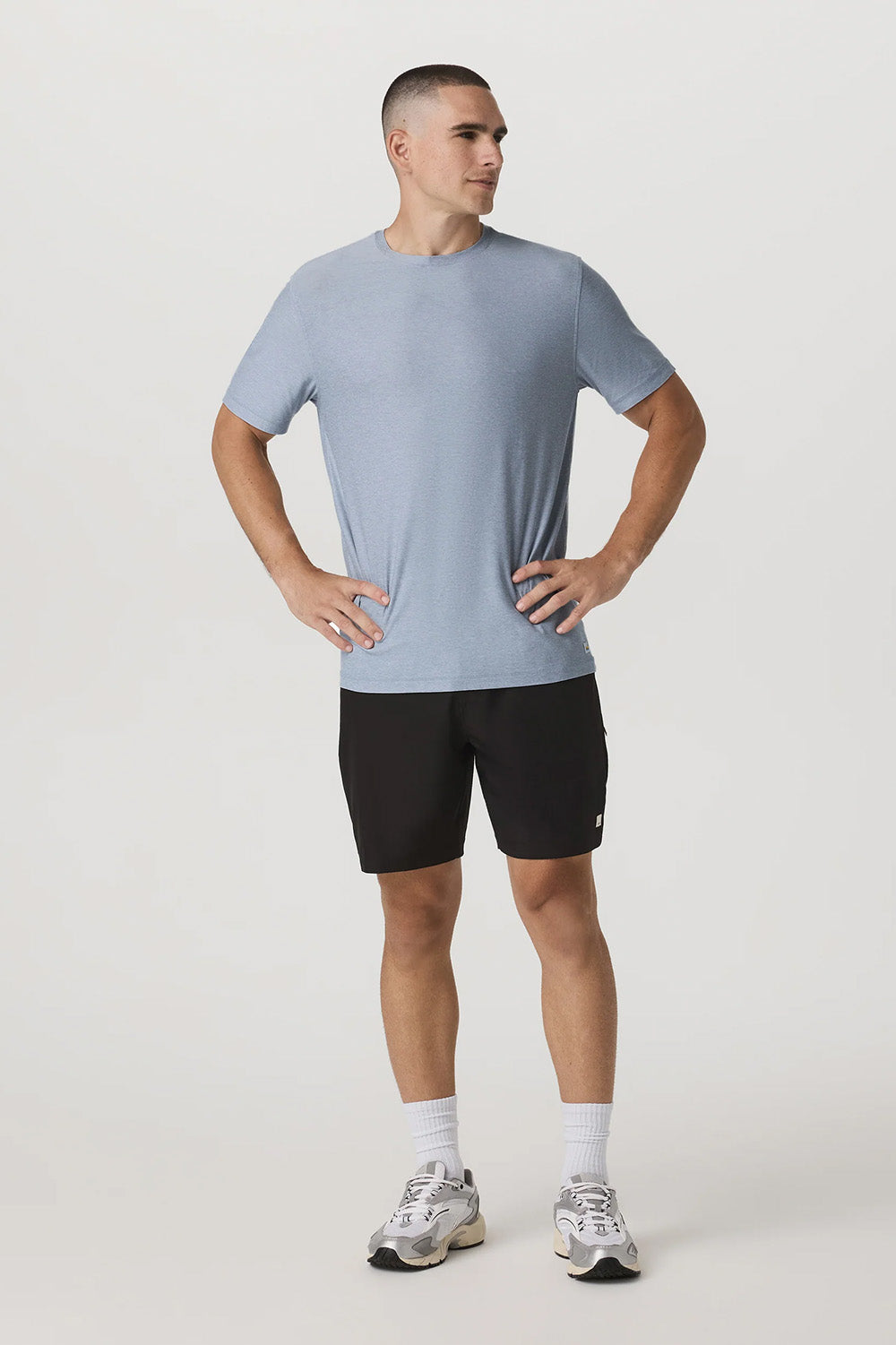 Vuori Strato Tech Tee in Blue Dusk Heather — Full-body view